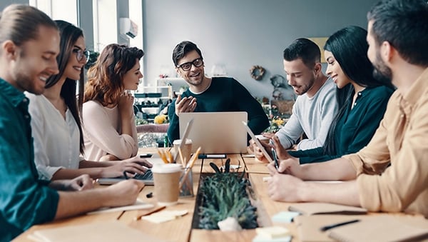 Marketing leader meeting with his team