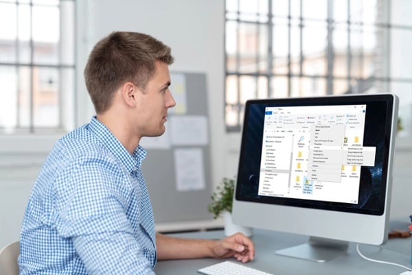 Man working on desktop computer