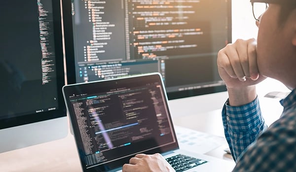 Developer looking at code