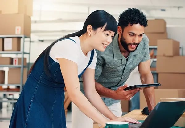 Supply Chain professionals on computer