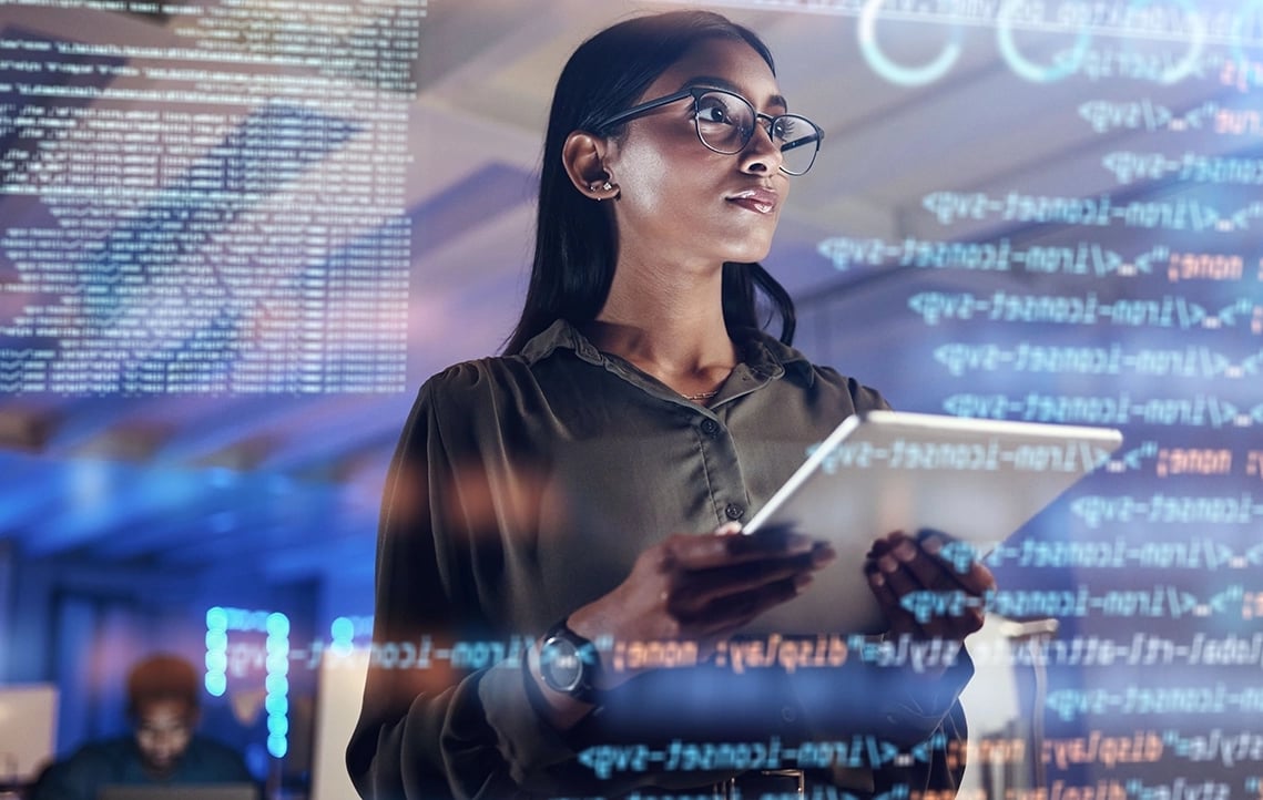 Woman developer looking at code
